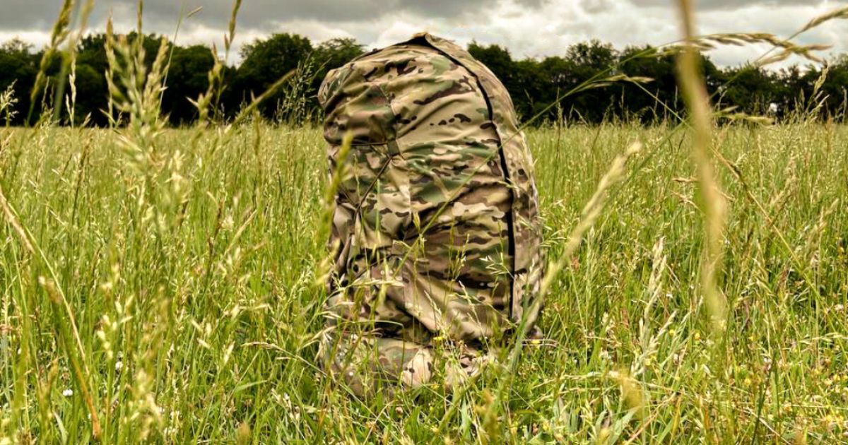 A backpack covered with One Hundred Concepts camo.